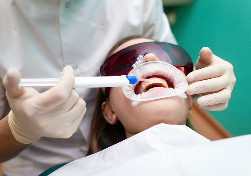 Dental patient receiving in-office whitening